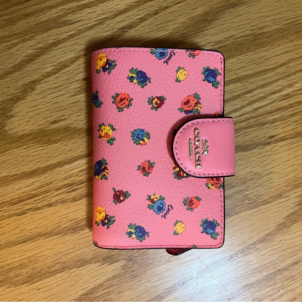 Coach medium corner zip wallet with pink vintage rose print